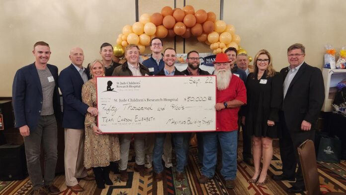 Maximus Building Supply presents check to St. Jude