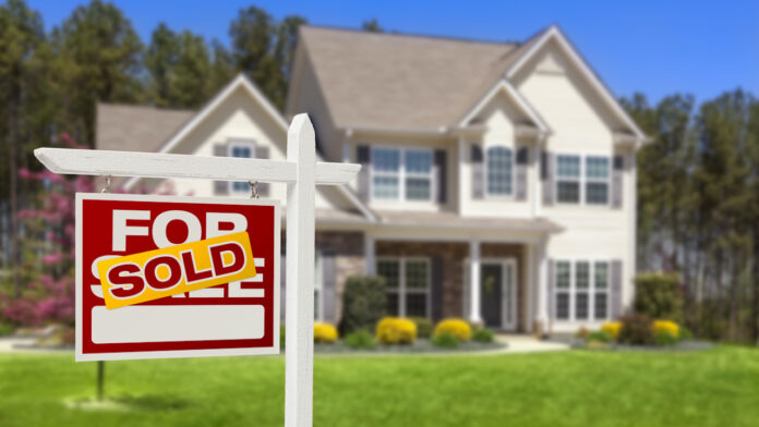 Sold Home For Sale Real Estate Sign and House New home sales